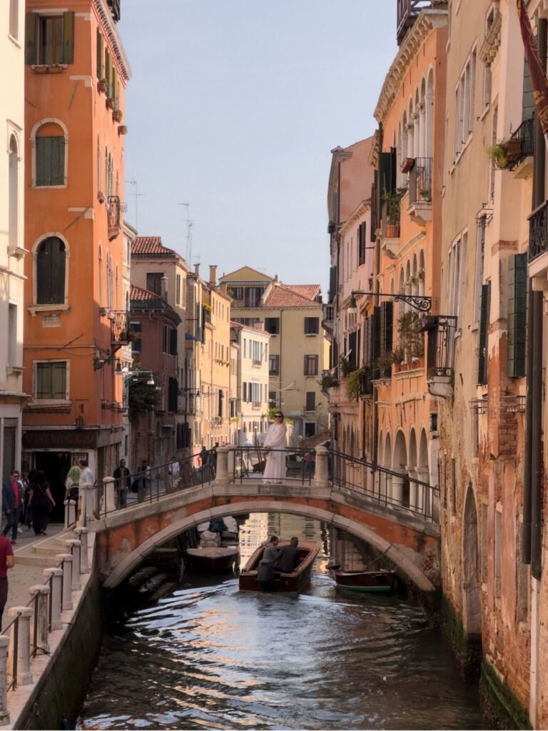 Author on a bridrge, view from Ponte San Felice Venice